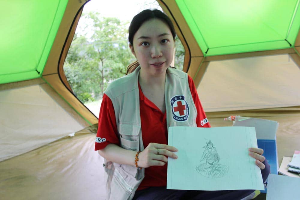 Clinical psychologist Eliza Cheung works with affected families to teach them about the critical role mental health plays following a traumatic experience. By Niki Clark ©IFRC